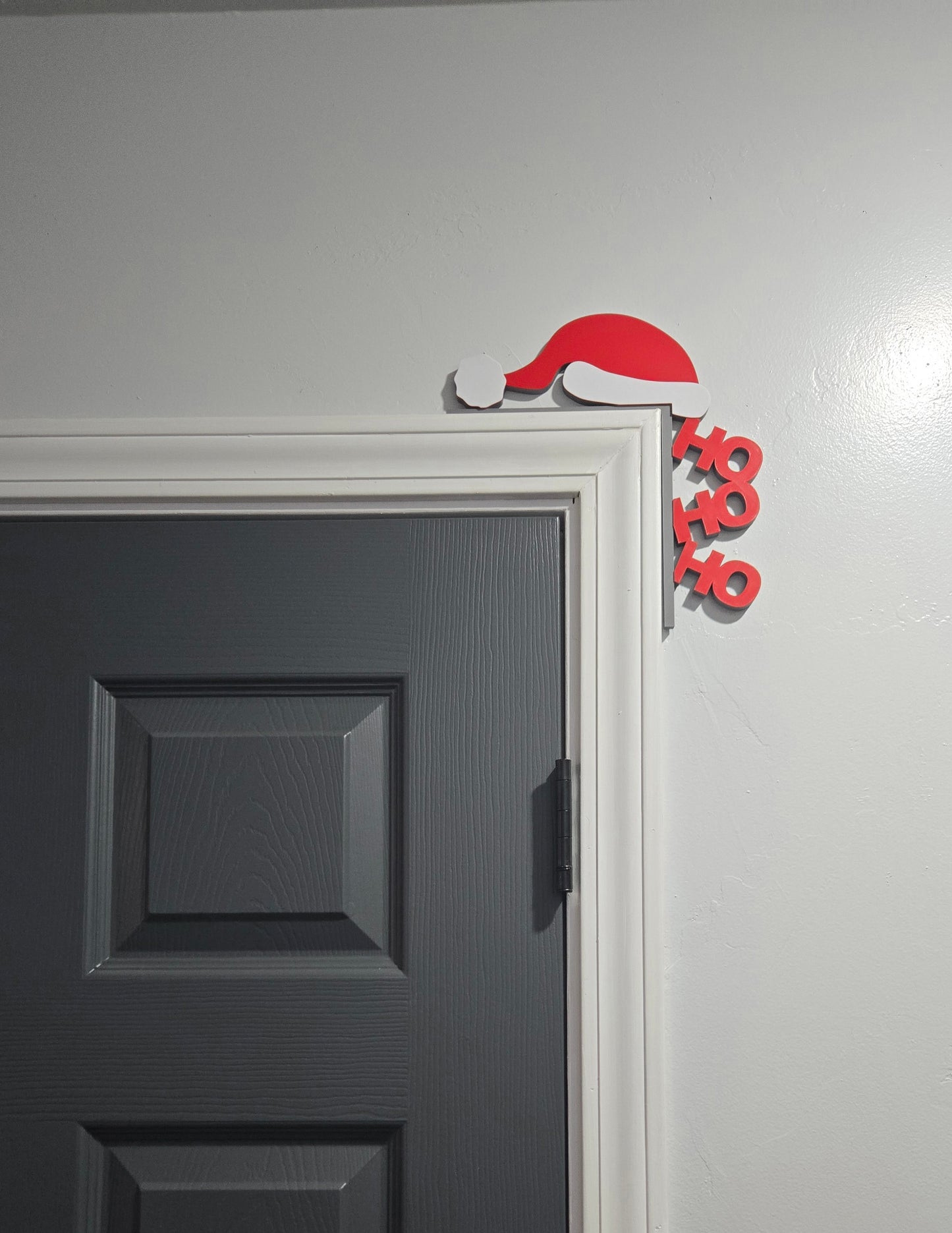 Santa Hat w/ Ho Ho Ho Over Door Décor - Red, White, and Grey